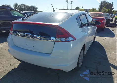 2012 Honda Insight from USA, damaged, VIN JHMZE2H3XCS000243
